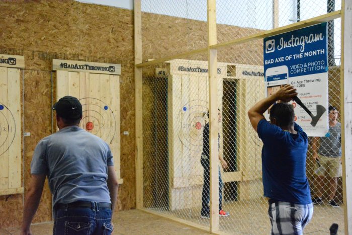 Axe throwing at a wooden target